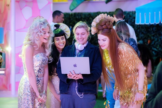 A production photo from the set of “Barbie” showing director Greta Gerwig