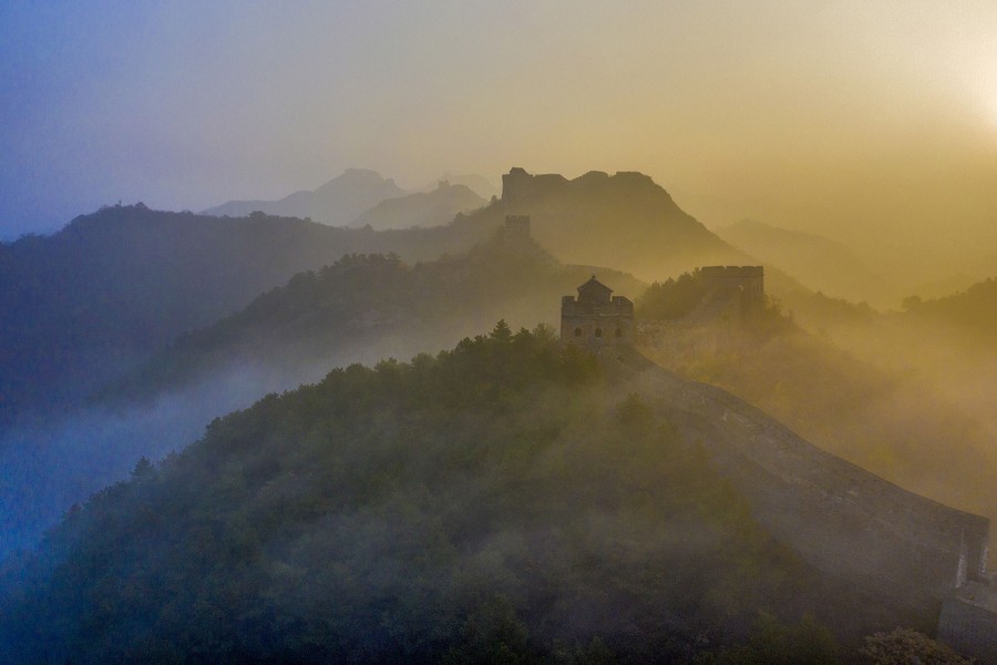 A foggy sunrise over part of China's Great Wall