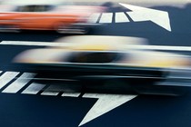 An art-photo image of classic cars.