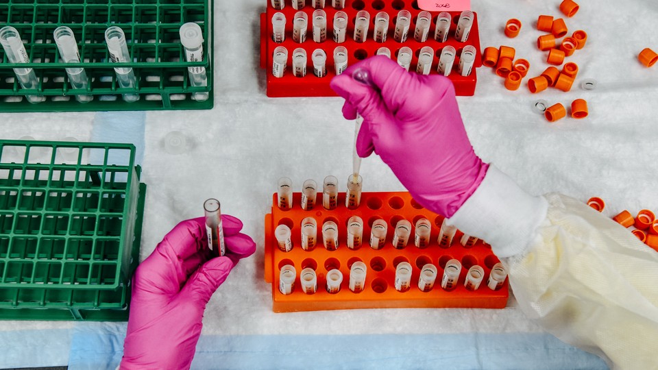 A lab technician tests blood samples.