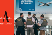 ICE agents stand guard at Newark Liberty International Airport.