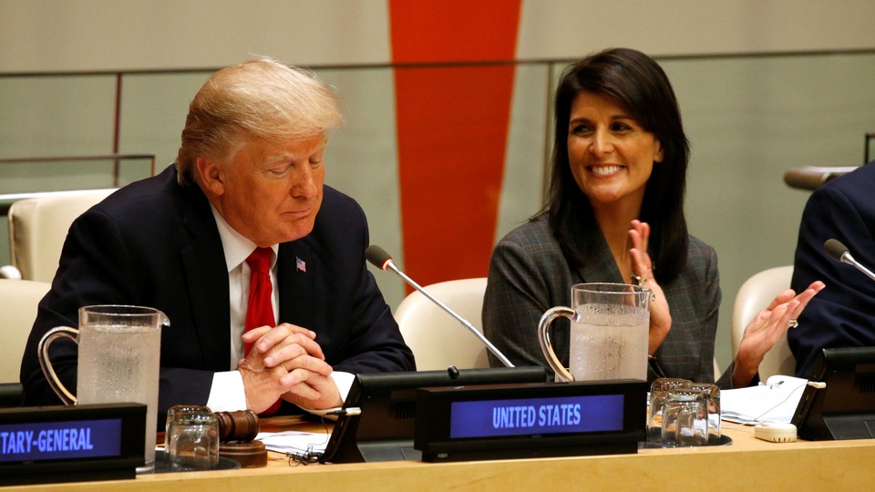Nikki Haley and Donald Trump sit together at the UN.