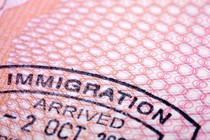 A close-up photo of a passport stamp