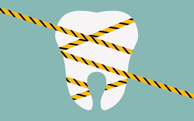 An illustration of a tooth wrapped in black and yellow barricade tape