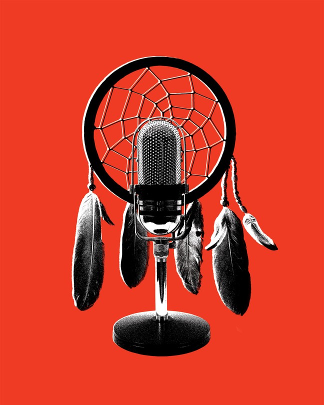 black-and-white podcasting microphone with dreamcatcher and feathers hanging from it on red background
