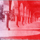 Red-tinted photo of arches at of Stanford University.