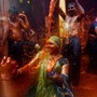 A man throws water on a woman during "Huranga," a game played between men and women a day after Holi, near Mathura, India.