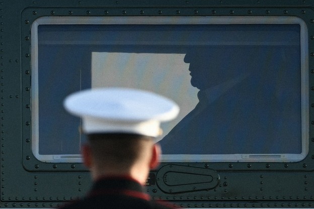 Photo of an American soldier from behind
