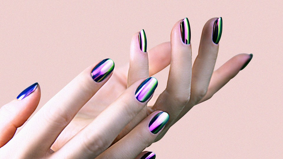 A person modeling chrome nail polish