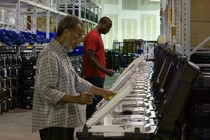 Voters use electronic voting machines.