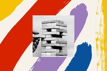 Image of hand removing a Jenga block from a Jenga stack