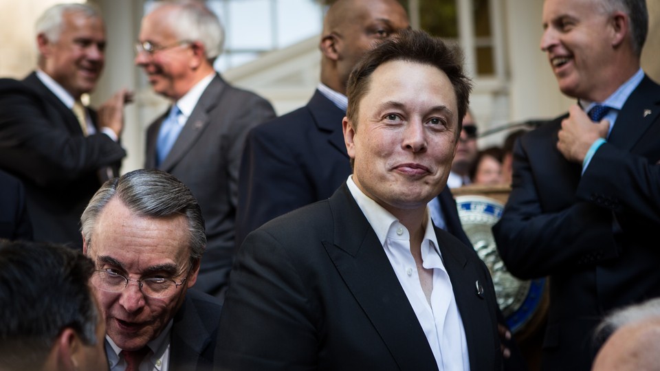 Elon Musk makes a face.