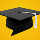 An illustration of a graduation cap against a golden-yellow background