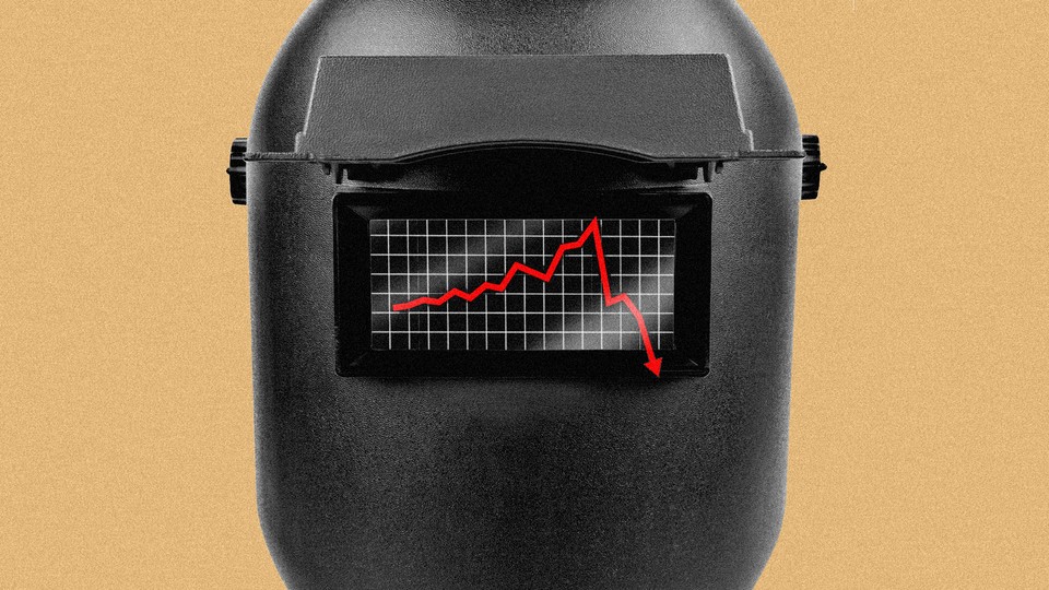 An image of a welding mask with a downward trending graph on top.