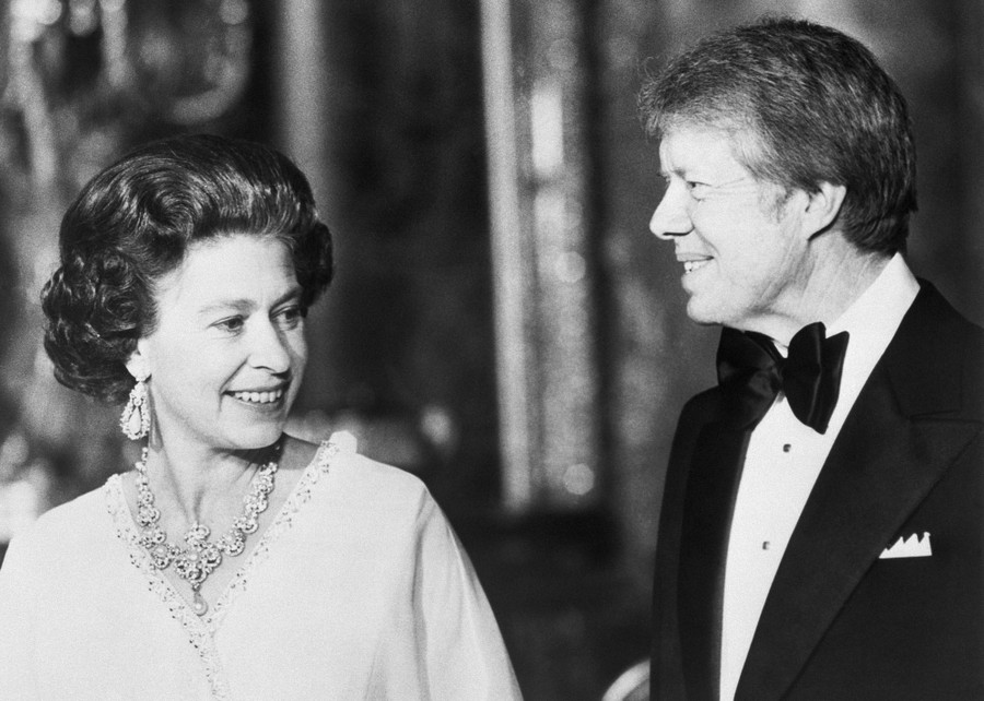 President Jimmy Carter stands with Queen Elizabeth.