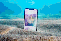 GIF of an iPhone sitting on sand underwater, scrolling through Hinge profiles.