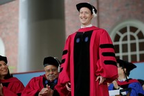 Mark Zuckerberg receiving an honorary diploma from Harvard.