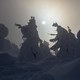 Snow-covered trees, nicknamed "snow monsters," are silhouetted by the sun at the summit of Mount Zao on January 19, 2019, near Yamagata, Japan.