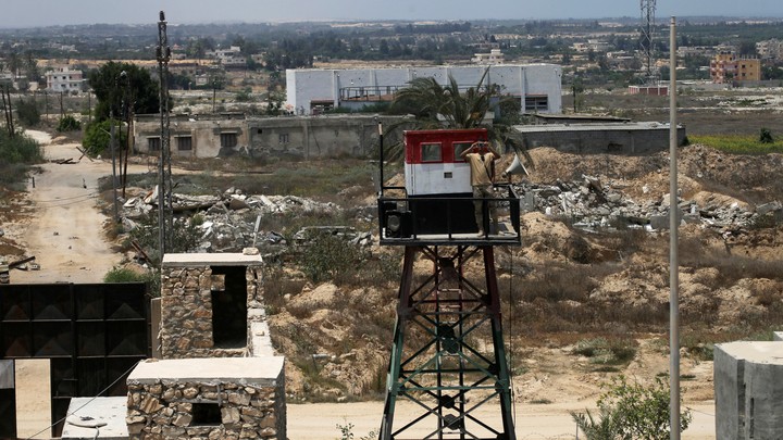 An Egyptian soldier guards the Egyptian side of the border between Egypt and the southern Gaza Strip on July 5, 2017.