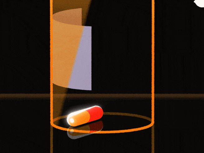 hand picking up a pill