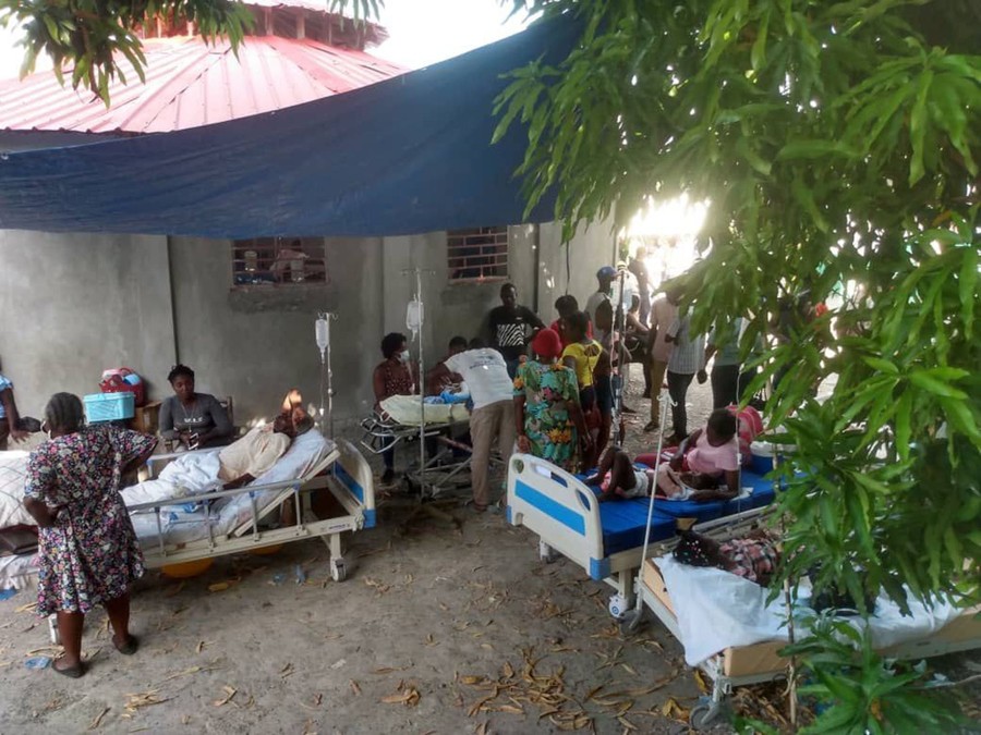 Injured people are treated in a field hospital in Jeremie.