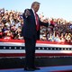 Trump shouts at a rally in front of a crowd