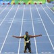 Jamaica's Usain Bolt poses after winning the gold.