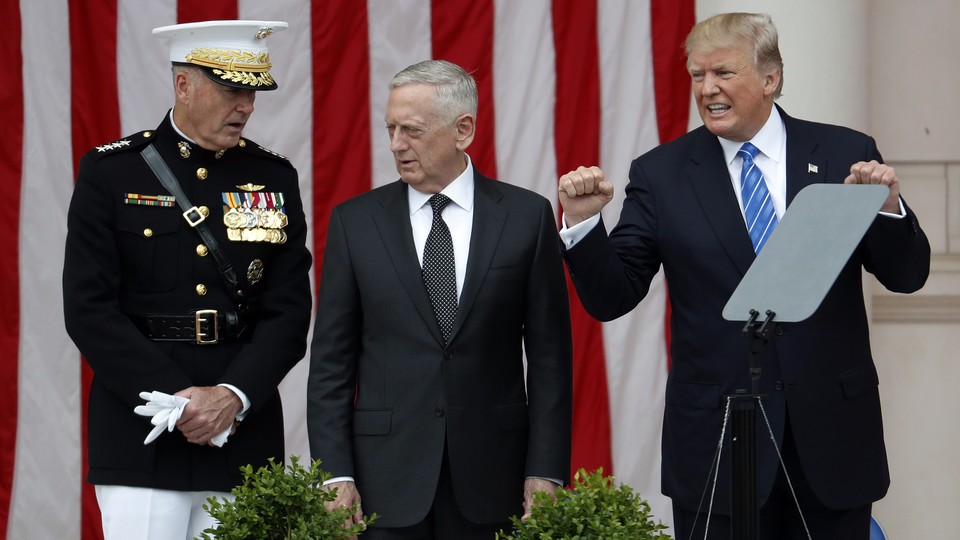 Donald Trump with General Joe Dunford, chairman of the Joint Chiefs of Staff, and Defense Secretary James Mattis