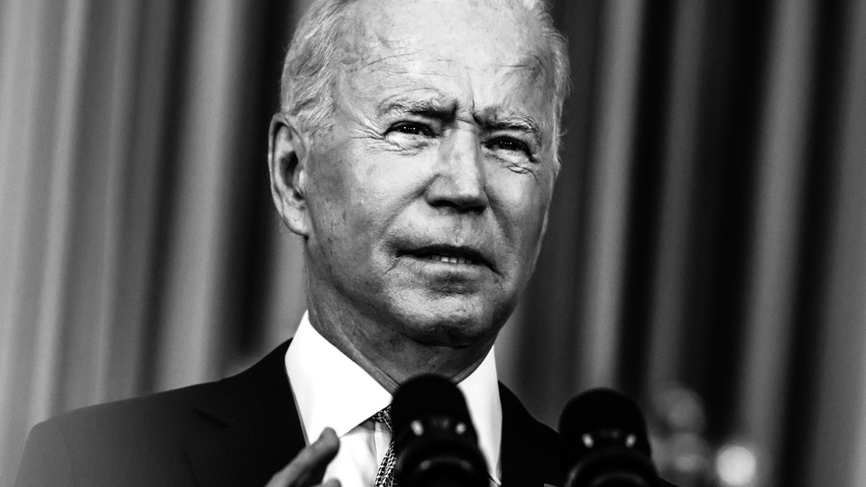 A black-and-white photograph of President Joe Biden