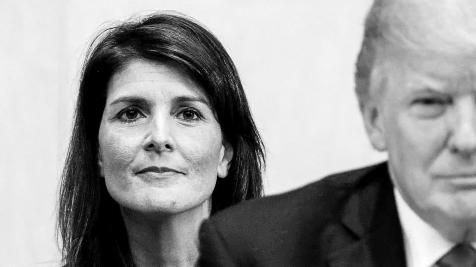 Black and white photo with Nikki Haley in the background and part of Donald Trump's face in the foreground