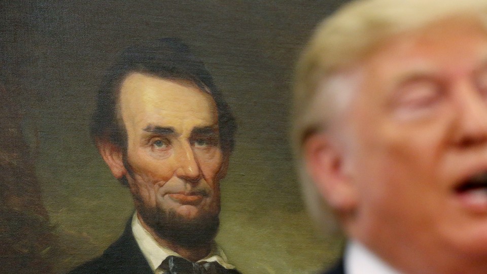 Donald Trump with Abraham Lincoln behind him.