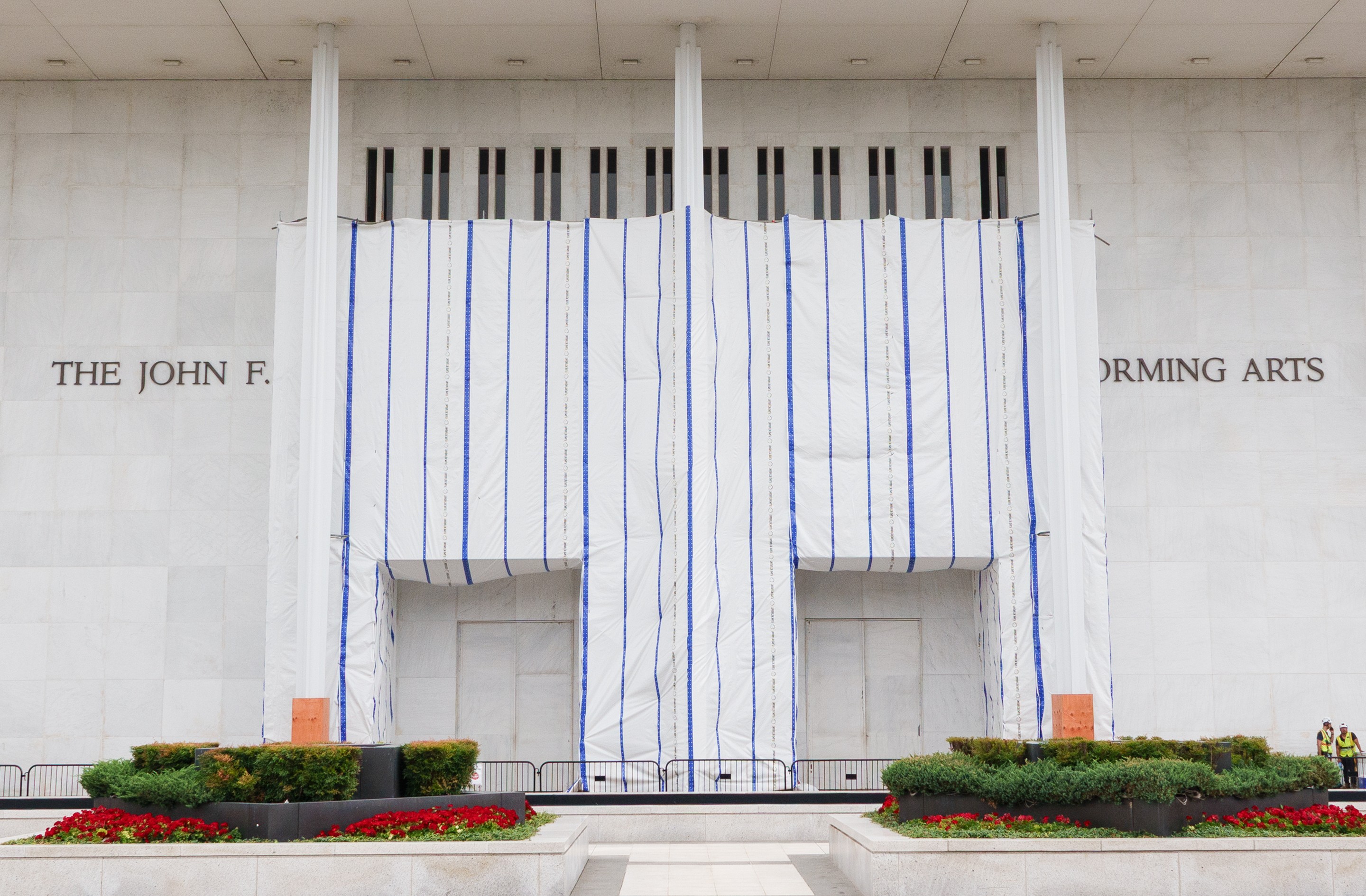construction tarps hang out front of the Kennedy Center