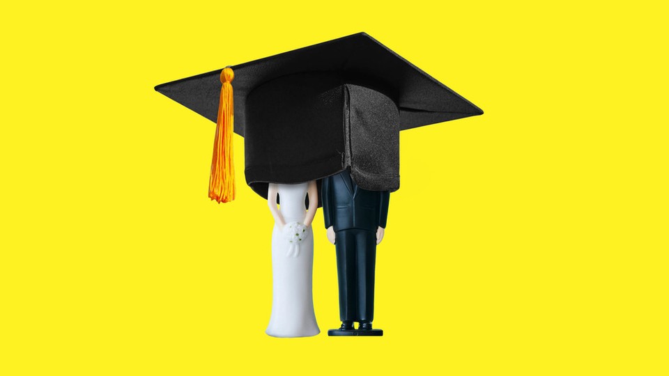 A wedding-cake topper covered with a graduation cap