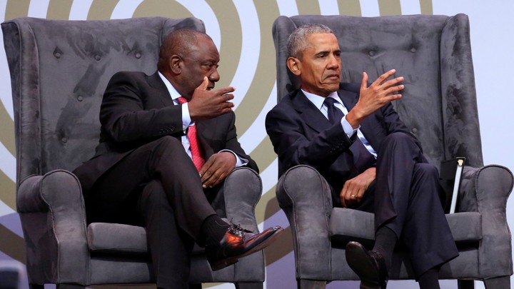 Cyril Ramaphosa and Barack Obama sit together during a discussion in Johannesburg in July.