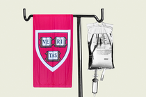a harvard emblem hung by an iv bag