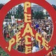 A peace sign in front of the White House