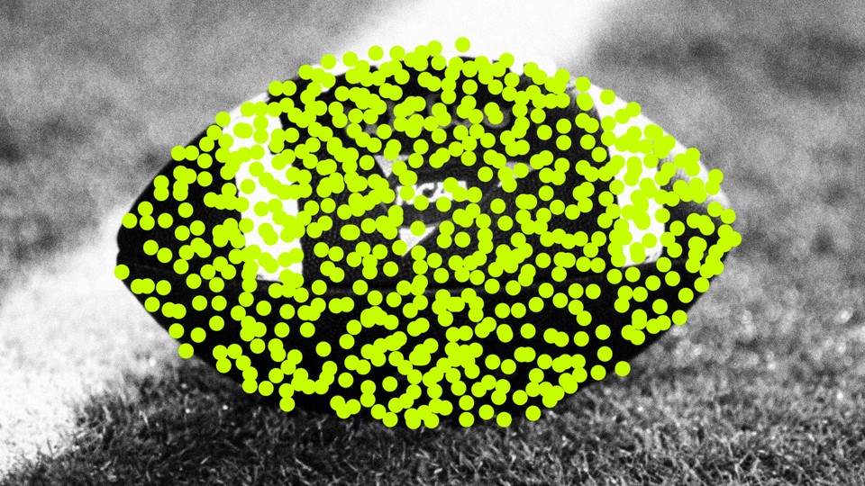 A football covered in green dots.