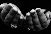 Hands cupped in prayer