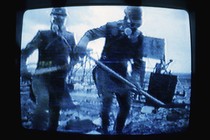 A still from a film of Chernobyl cleanup workers playing at Kyiv’s Chernobyl Museum in 2001.