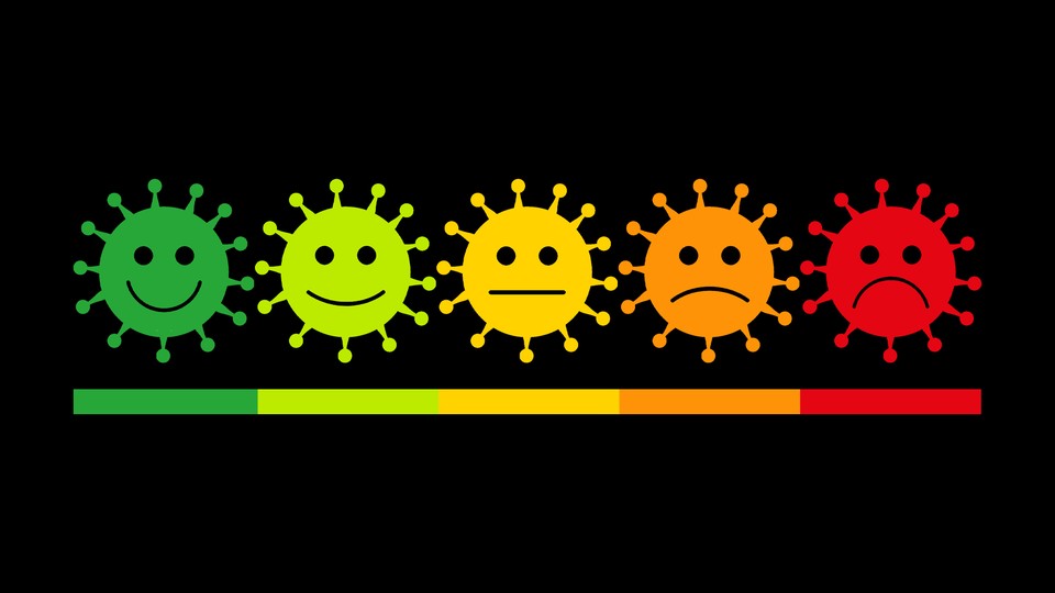 A spectrum of coronaviruses with sad and happy faces on them.
