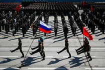 Russian soldiers march in a parade.