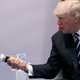 U.S. President Donald Trump shakes hands with Russian President Vladimir Putin during the their bilateral meeting at the G20 summit in Hamburg, Germany, July 7, 2017.