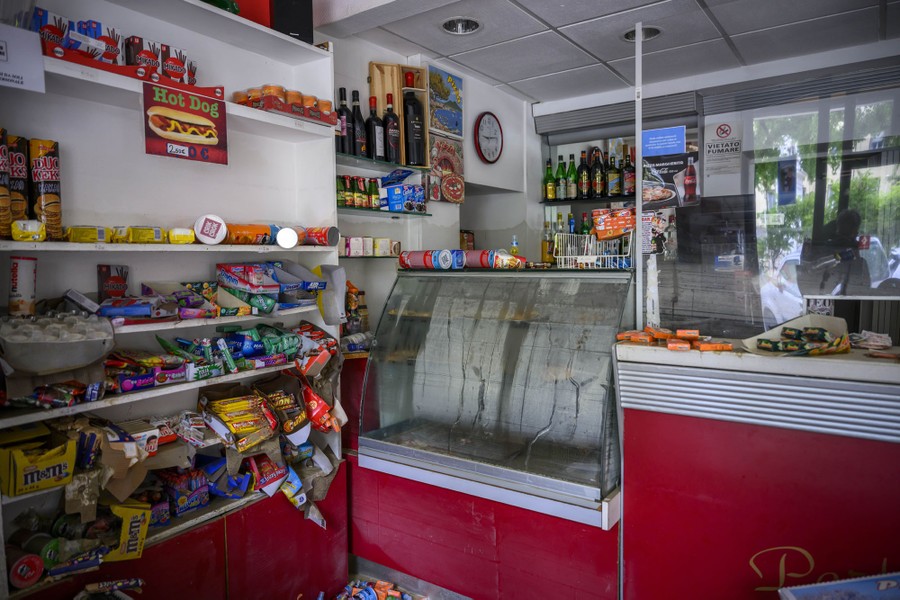 The interior of a small café in disarray after floodwaters had receded