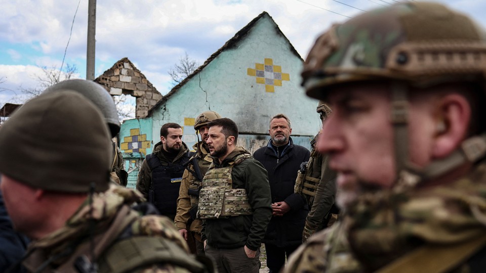 President Volodymyr Zelensky walking through Bucha, Ukraine