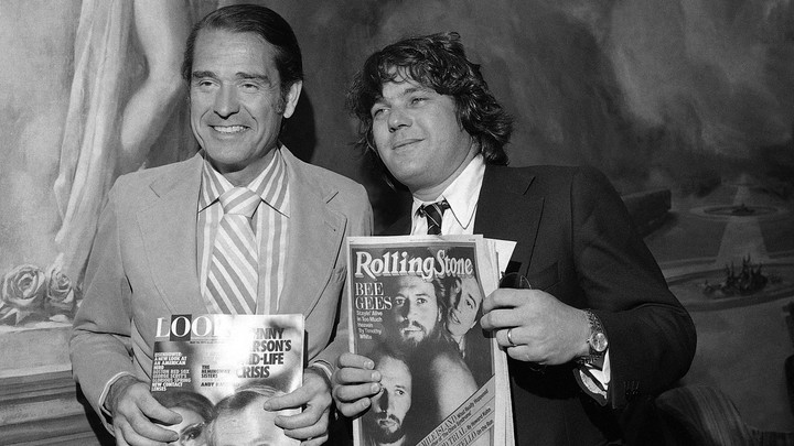 The Look Magazine owner Daniel Filipacchi stands with the editor and publisher of Rolling Stone Jann Wenner in 1979.