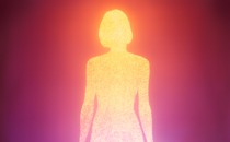 A woman in silhouette, filled with glowing points of light