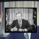 Jimmy Carter on a television screen
