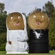 Bales of hay dressed up to look like a bride and groom