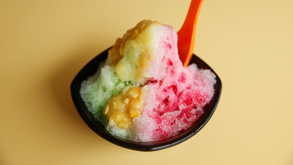 A small bowl of colorful shaved ice