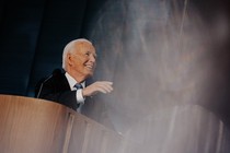 Joe Biden smiling onstage at the DNC